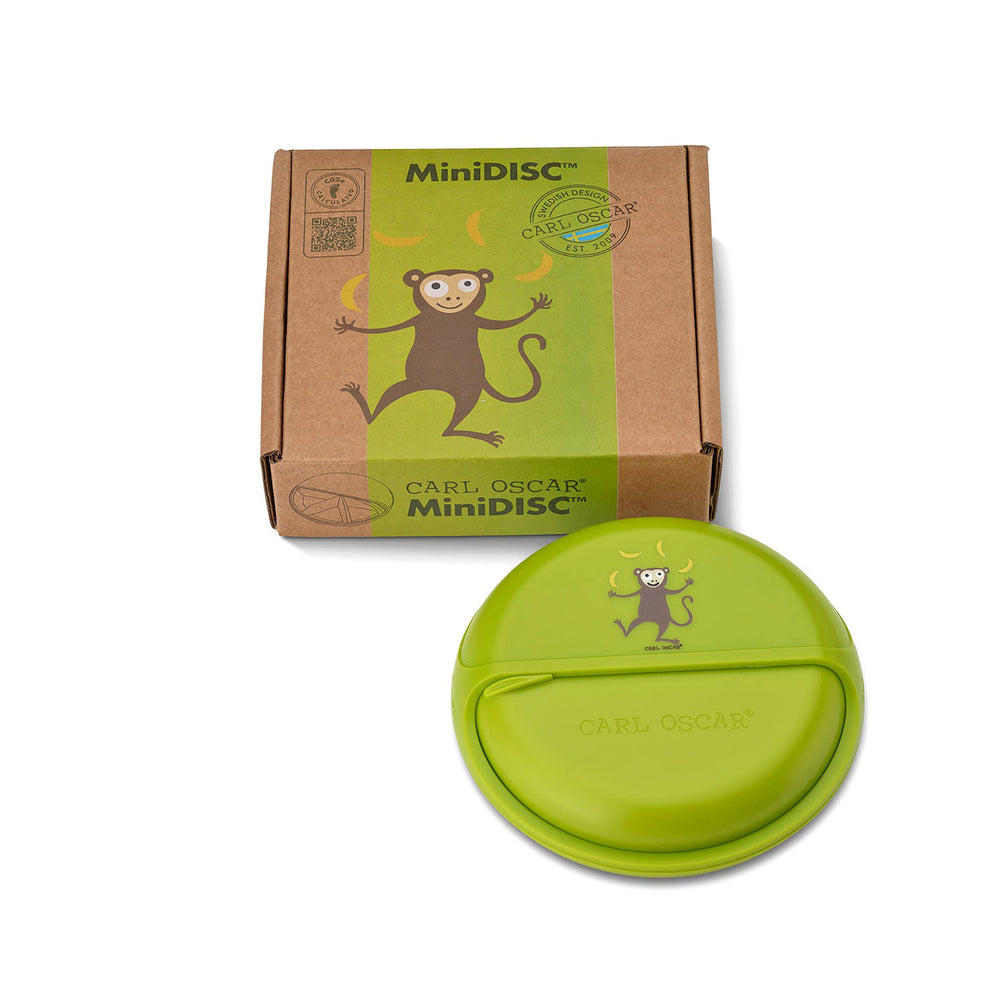 MiniDISC™ Lime Monkey – Snackspender mit drehbaren Fächern